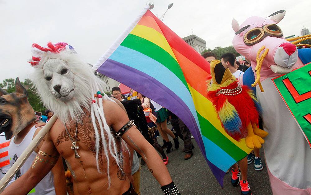 Revelers participate in a gay pride parade in Taipei, Taiwan.