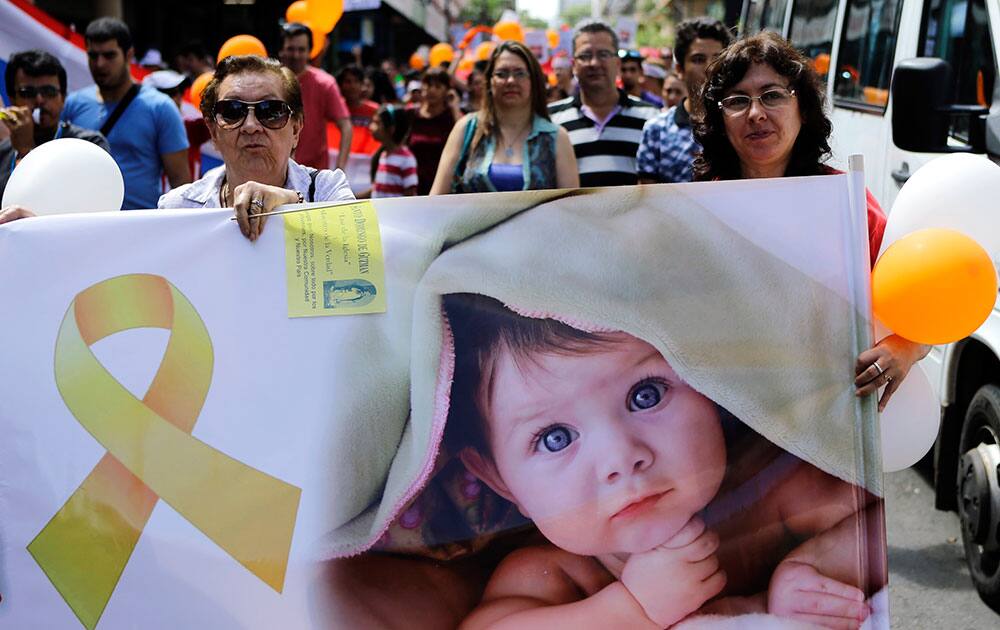 Catholics and Evangelists march against same-sex marriage and abortions in Asuncion, Paraguay.