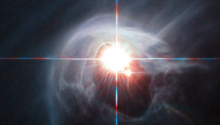 Hubble zeros in on quadruple star system DI Cha