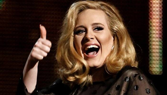 Adele breaks record with million song downloads