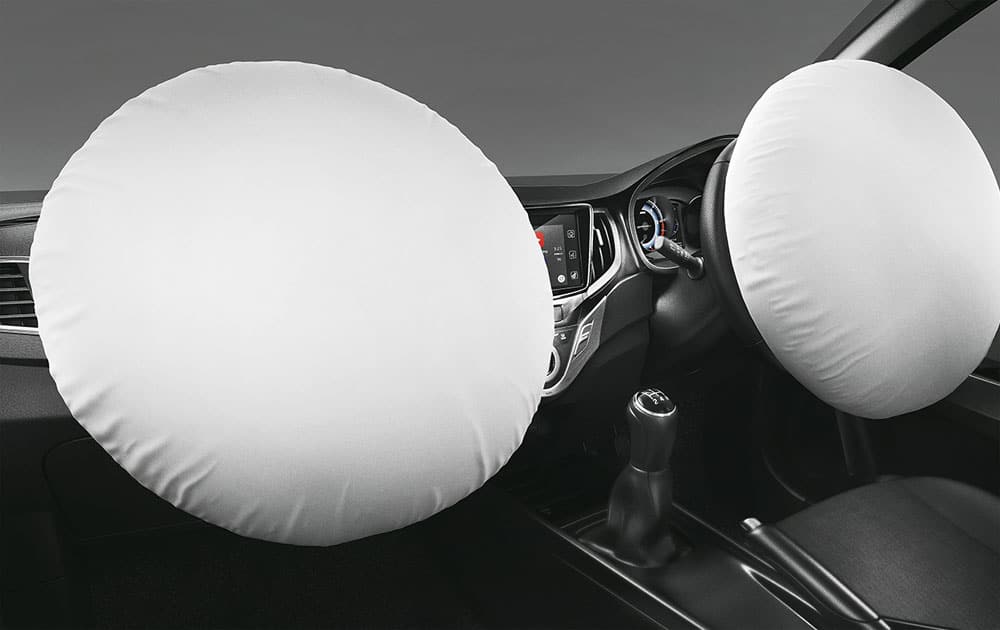 Dual front airbags mitigate collision forces in the event of a frontal impact.