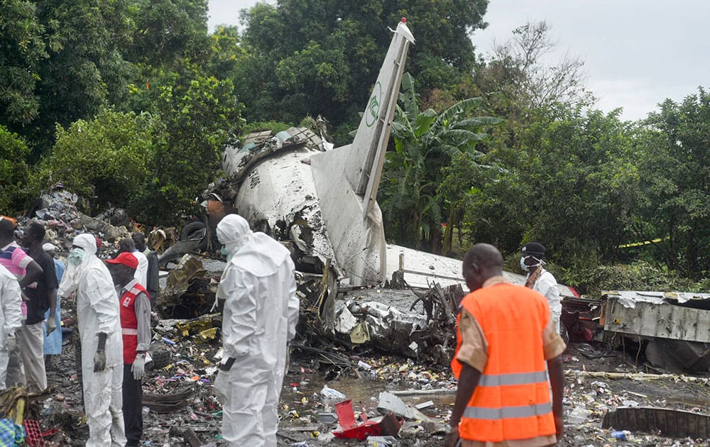 Responders pick through the wreckage of a cargo plane which crashed in the capital Juba, South Sudan.