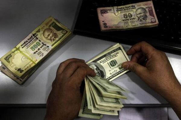 Rupee ends 26 paise down at 65.75 against USD