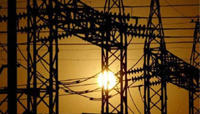 Govt unveils scheme to revive debt-ridden discoms