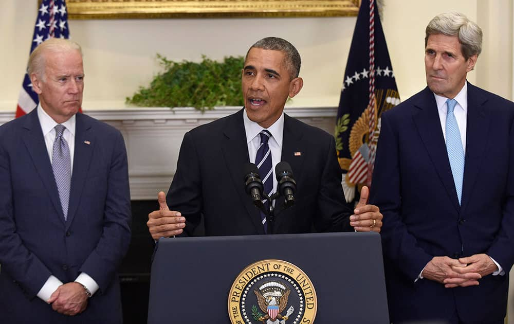 President Barack Obama, accompanied by Vice President Joe Biden and Secretary of State John Kerry, announce hes rejecting the Keystone XL pipeline because he does not believe it serves the national interest, in the Roosevelt Room of the White House in Washington.