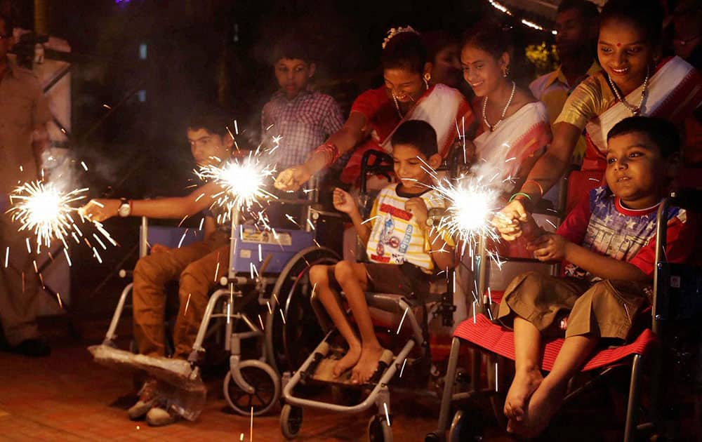 Special children celebrating Diwali festival at a school at Thane in Mumbai.