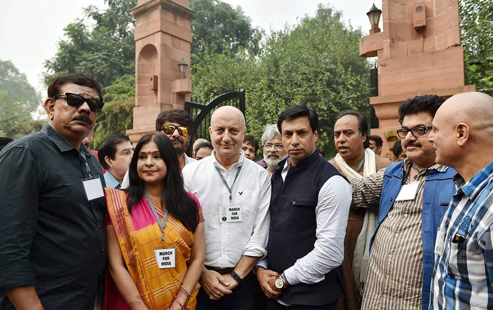 Bollywood actor Anupam Kher, Madhur Bhandarkar, Ashoke Pandit, Priyadarshan, Manoj Joshi, Malini Awasthi and other film personalities after meeting President Pranab Mukherjee at Rashtrapati Bhavan following their March for India programme over intolerance issue, in New Delhi.