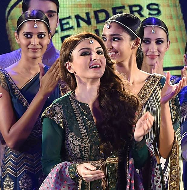 Actress Soha Ali Khan with models during a fashion show in Kolkata.