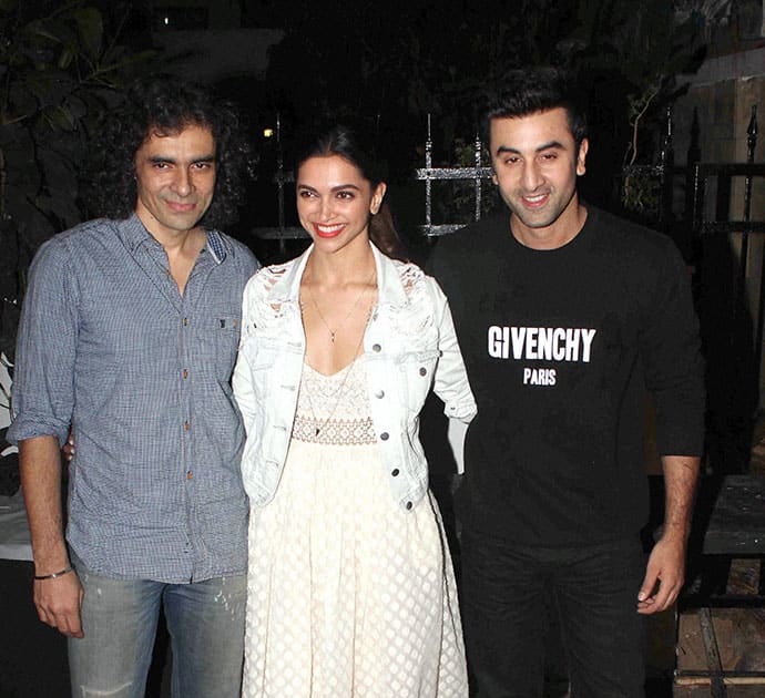 Filmmaker Imtiaz Ali, actors Deepika Padukone and Ranbir Kapoor arrive to watch a play at Prithvi Theatre in Mumbai.