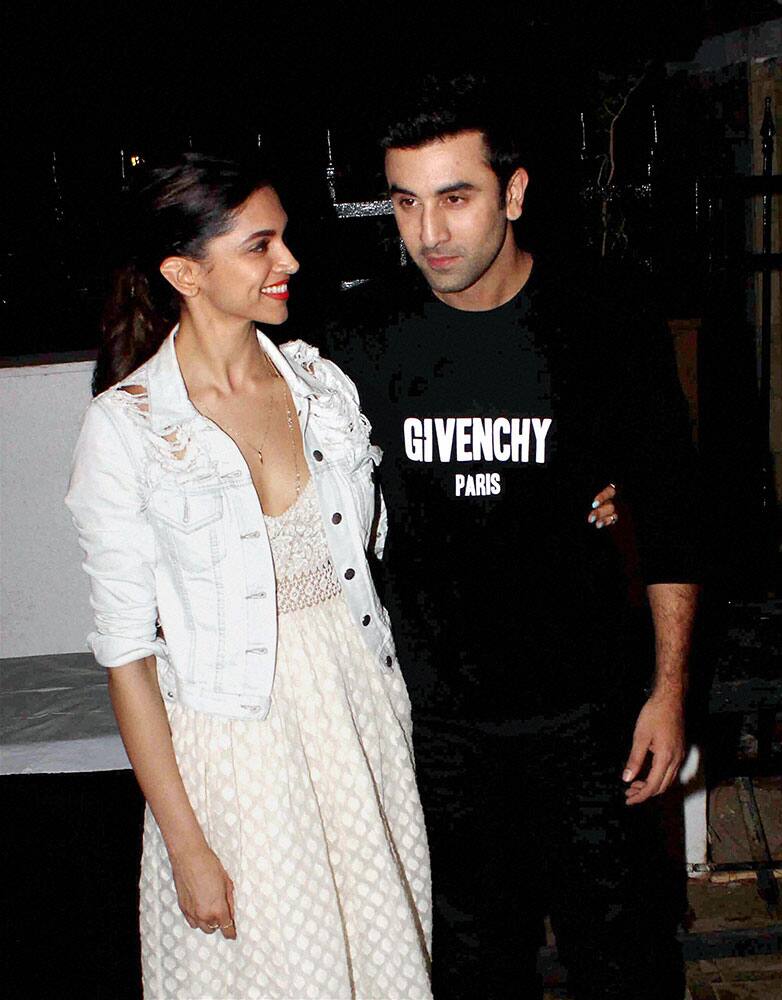 Actors Deepika Padukone and Ranbir Kapoor arrive to watch a play at Prithvi Theatre in Mumbai.
