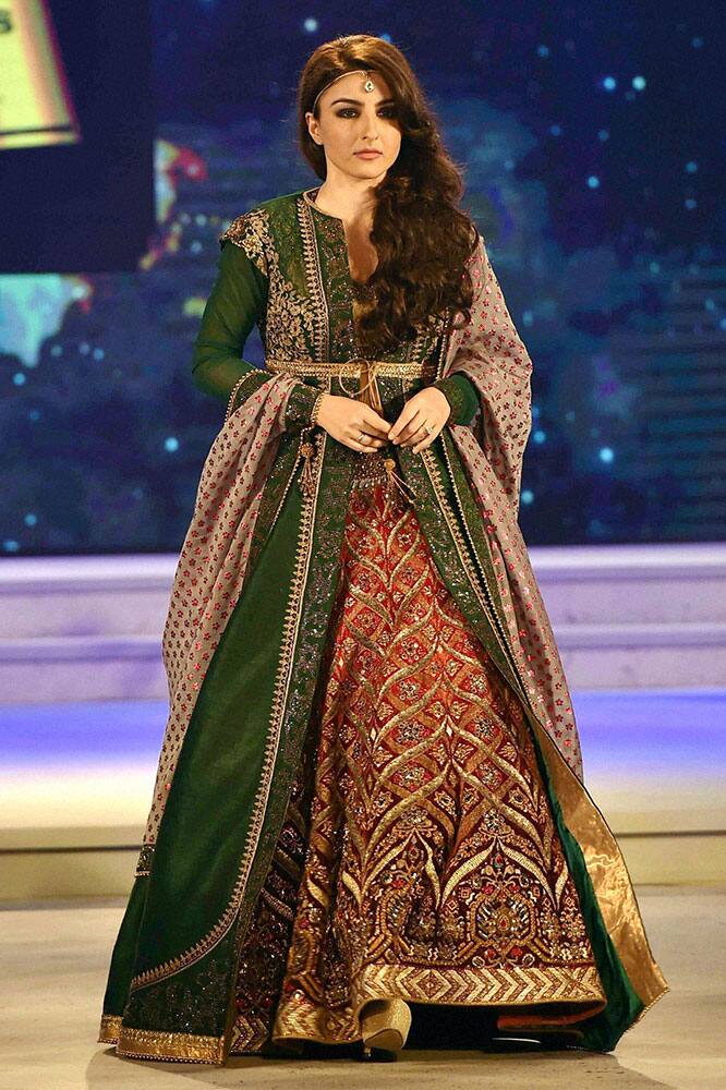 Actress Soha Ali Khan walks the ramp during a fashion show in Kolkata.
