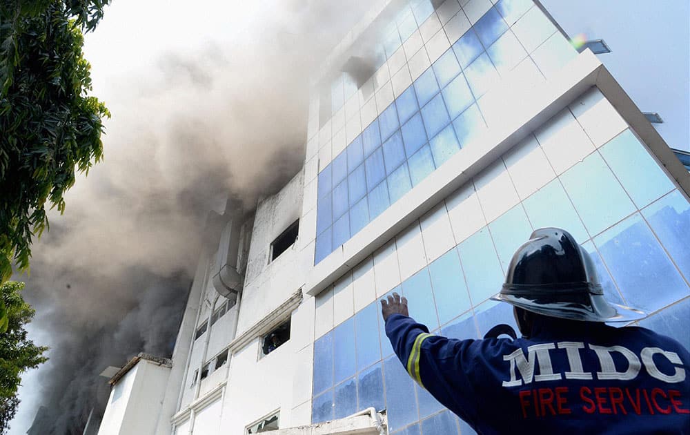 Smoke billowing out after a fire at a chemical factory in Navi Mumbai.