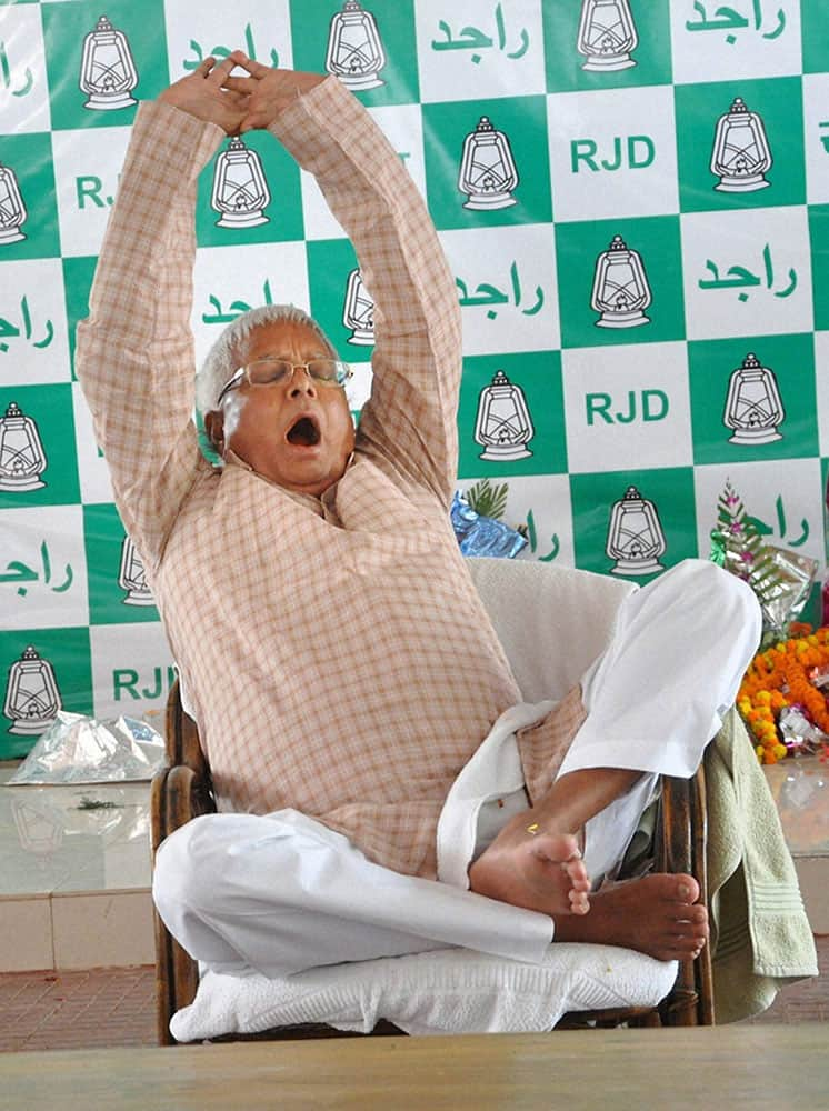 RJD chief Lalu Prasad relaxes at his residence in Patna on Monday a day after Bihar polls results.