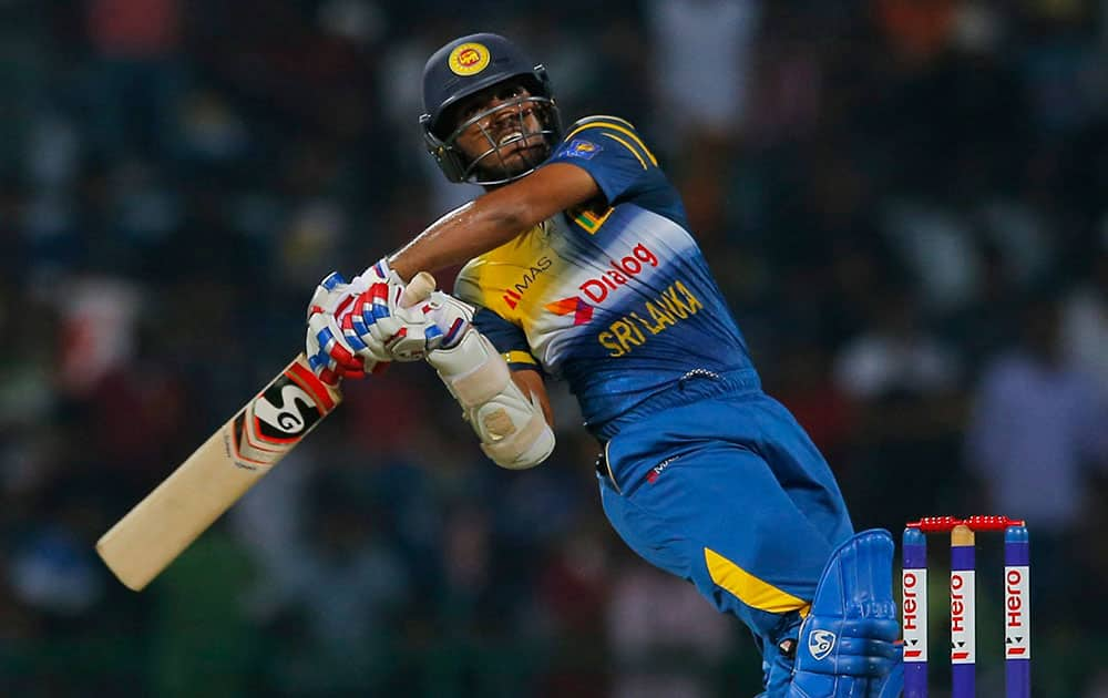 Sri Lankas Shehan Jayasuriya plays a shot during their first Twenty20 cricket match against West Indies in Pallekele, Sri Lanka.