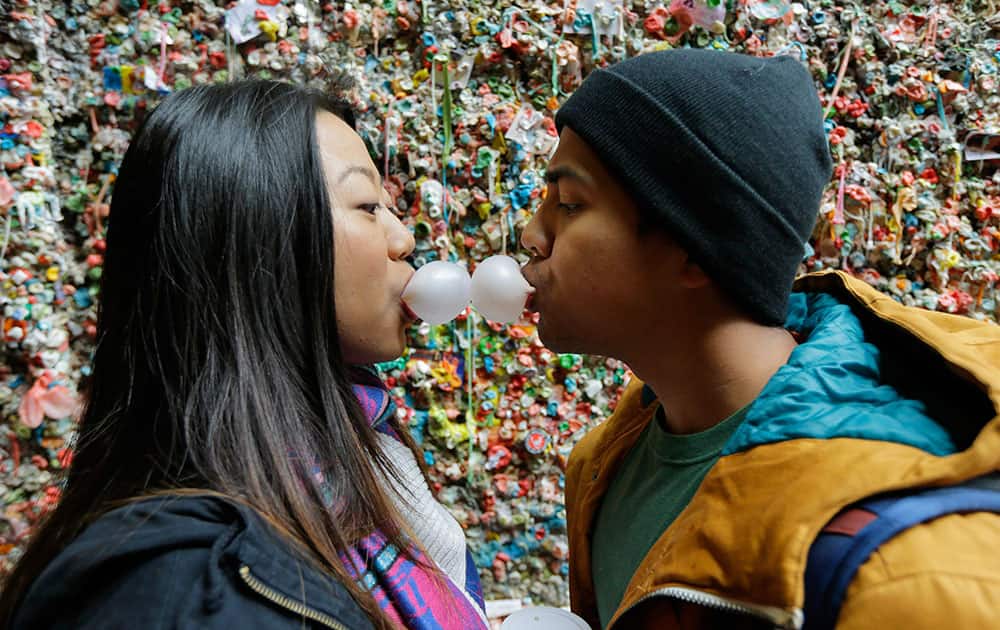 Jessica Wang, left, and Michael Teylan, both of Los Angeles, create a 