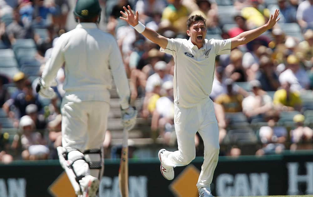 New Zealand's Trent Boult appeals for the wicket of Australia's Dave Warner during their cricket test match in Perth, Australia.