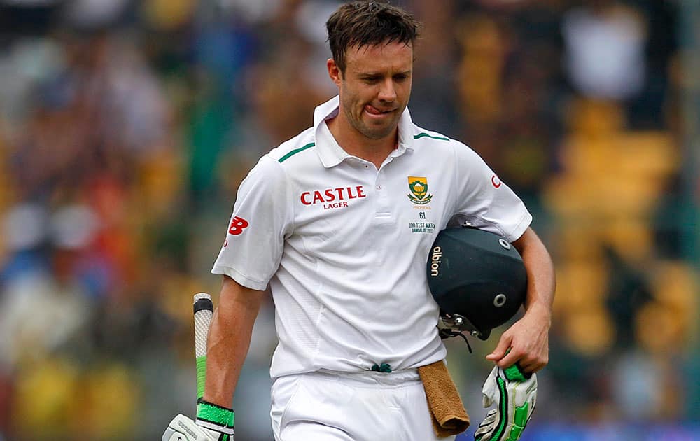 AB de Villiers reacts as he leaves the ground after losing his wicket during the first day of their second cricket test match in Bangalore.