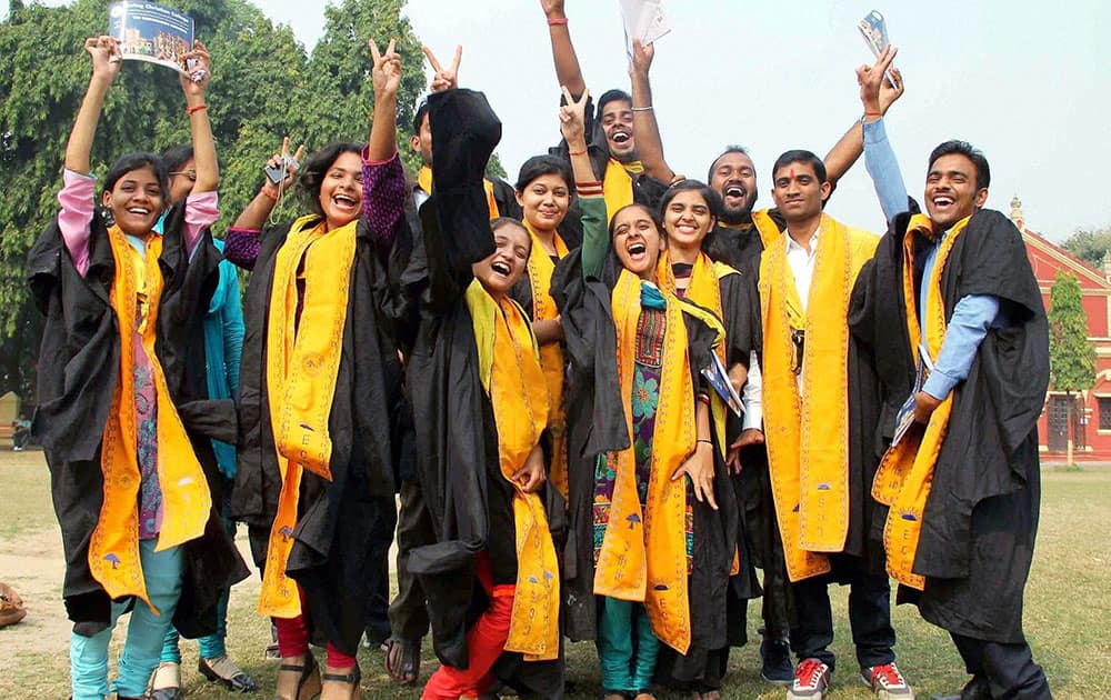 Students jubilate after receiving degree and certificates during 18th Convocation of Ewing Christian College in Allahabad.