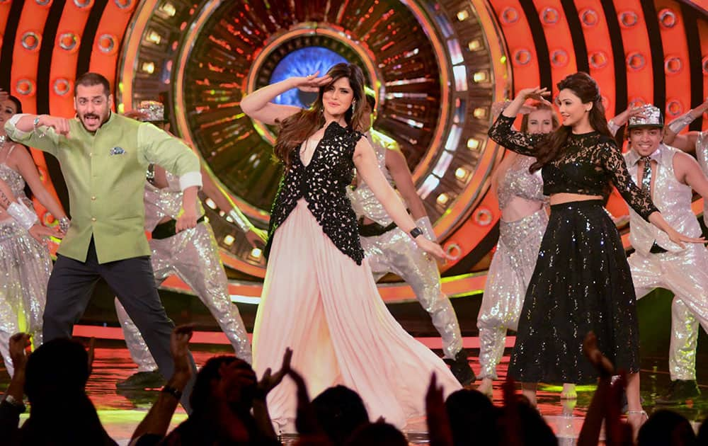 Bollywood Actor Salman Khan with Zarine Khan and Daisy Shah performing during the promotion of their upcoming movie Hate Story 3 on the TV show Bigg Boss set.