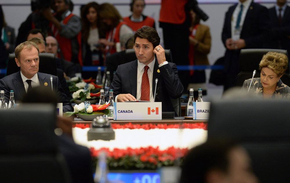 Canada's Prime Minister Justin Trudeau, middle, takes part in a plenary session at the G20 Summit in Antalya.