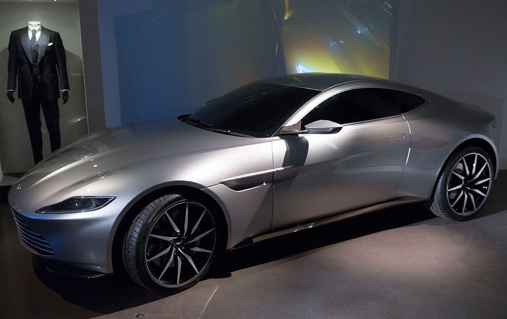 The Aston Martin DB10 and black suit used in the filming of new Bond film Spectre join the largest collection of 007 vehicles in the world, at the London Film Museum, London.