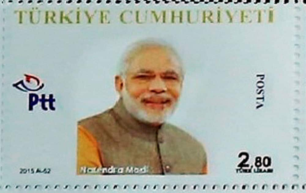 Personalized stamp of Prime Minister Narendra Modi which was presented by Turkish President Recep Tayyip Erdogan (not seen) in remembrance of G20 Turkey Leaders Summit in Antalya, Turkey.