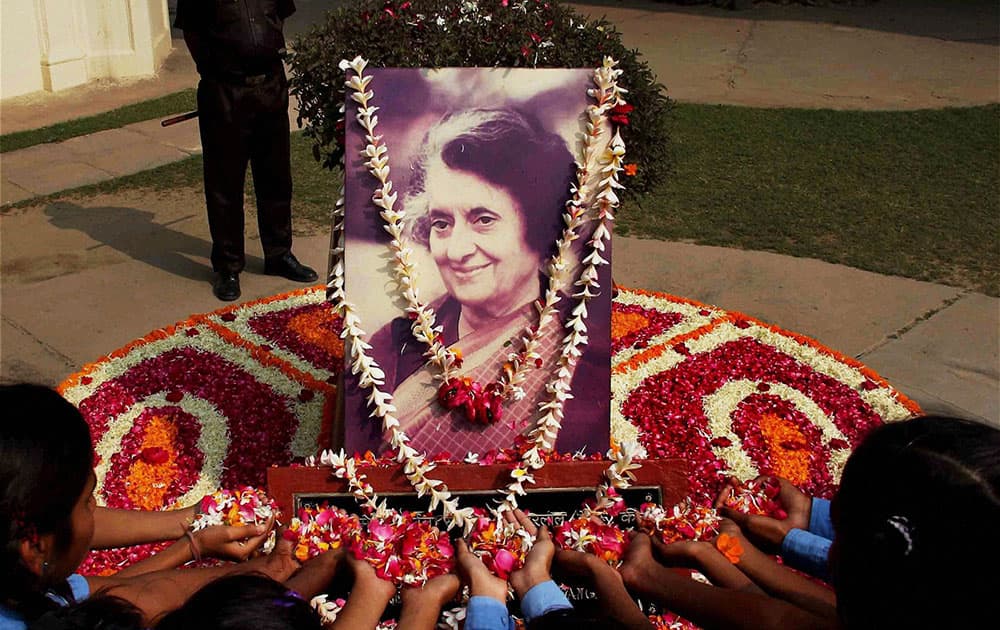 Students pay floral tributes to Indira Gandhi on her 98th birth anniversary at Anand Bhawan.