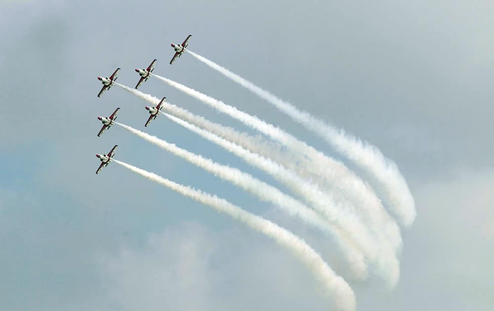 Taiwan air force AT-3 jets fly over Hsinchu Air Force base during an air show in Hsinchu, Taiwan. Taiwan government opened the air force base to the public to make good relationship with people.