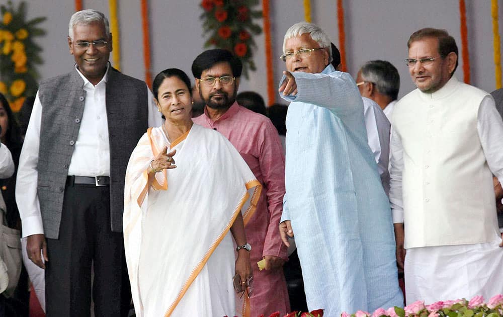 RJD chief Lalu Prasad, West Bengal Chief Minister Mamata Banerjee, JDU leader Sharad Yadav and CPI leader D. Raja during the swearing-in ceremony of the new government at Gandhi Maidan.