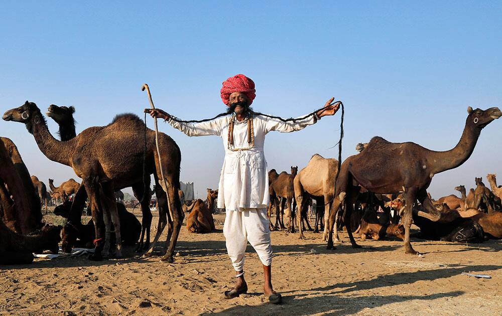 73-year-old Ramnath Chaudhary displays his moustache at the annual cattle fair in Pushkar, in the western Indian state of Rajasthan.