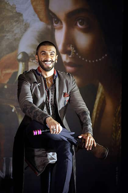 Bollywood actor Ranveer Singh laughs as he speaks during the trailer launch of his movie 'Bajirao Mastani' in Mumbai.