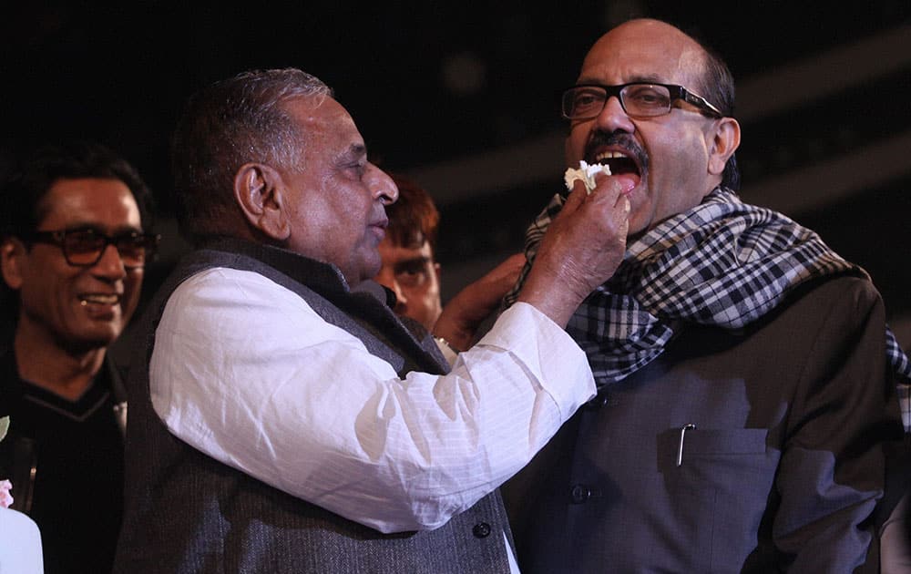 Samajwadi Party supremo Mulayam Singh Yadav with Amar Singh celebrate his 77th birthday in Saifai.