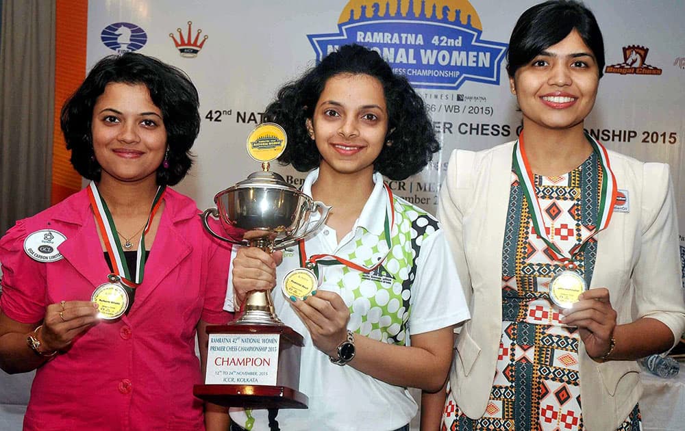 Winner of 42nd National Premier Women Chess Championship-2015 Padmini Rout of Odisha with the runner-ups Soumya Swaminathan(R) of Indian Oil and 2nd runner-up Bhakti Kulkarni(L) of Goa during the prize distribution ceremony, at ICCR in Kolkata.