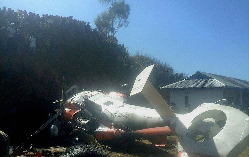The wreckage of a chopper which crashed while carrying a disaster management team, near Meluri in Nagaland.