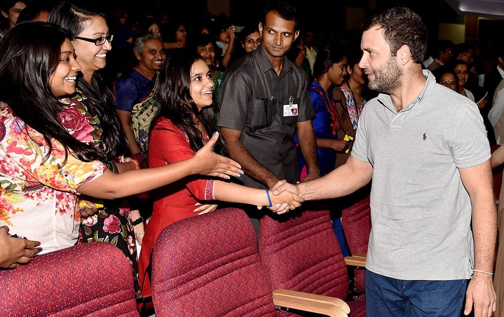 Congress Vice President Rahul Gandhi greet students on his arrival at a interactive session with students of Mount Carmel College in Bengaluru.