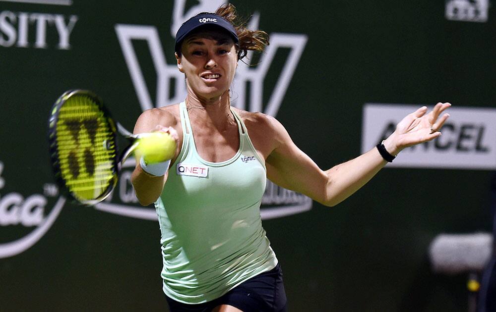 Hyderabad Aces Tennis Player Martina Hingis in action against Heather Watson of Chennai Warriors during the Champions Tennis League 2015 at SDAT Stadium in Chennai.