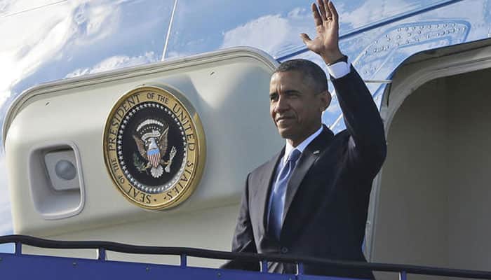 US President Barack Obama signs defence bill despite Guantanamo shut down restrictions