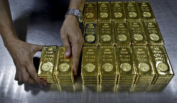 Gold price dips to near 6-year low, set for 6th straight weekly drop