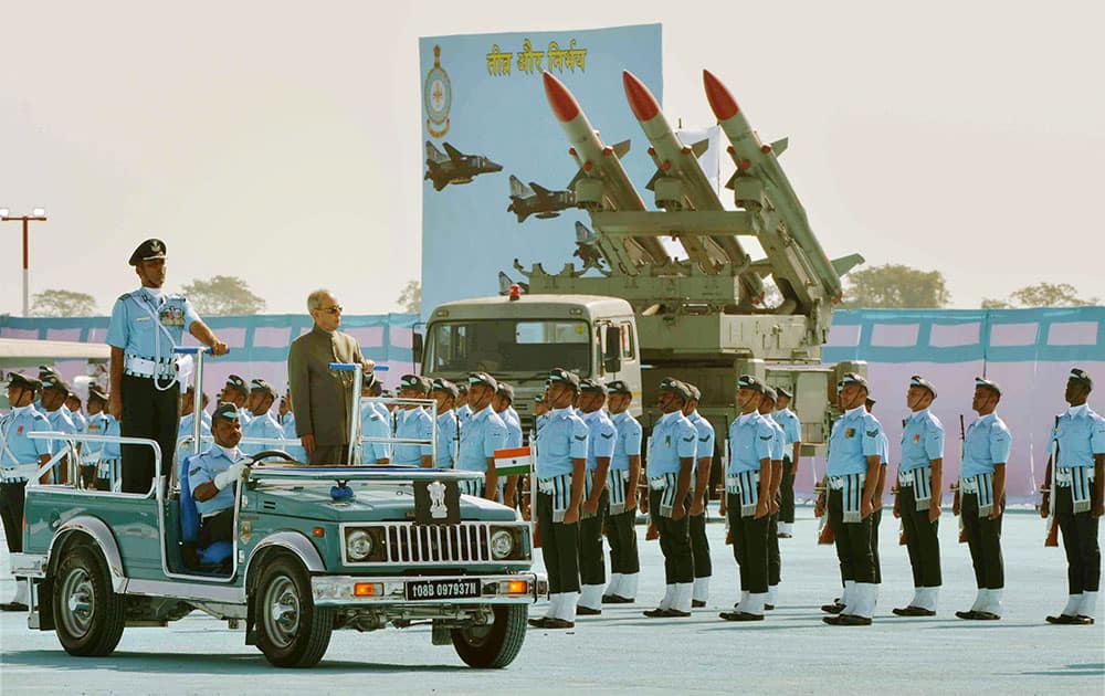 President Pranab Mukherjee inspects a guard of honor during a Standard Presentation to 18 and 22 Squadron of Indian Air Force at Air Force Station at Hasimara in West Bengal.