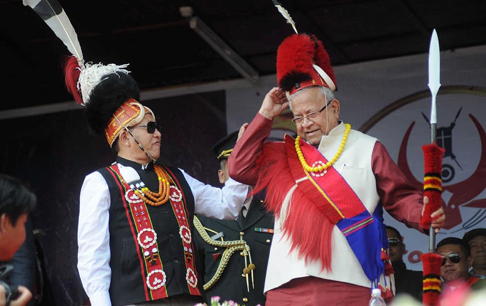 Nagaland Governor Padmanabha Balakrishna Acharya and Chief Minister TR Zeliang wear traditional dresses during the Hornbill festival in Kohima.