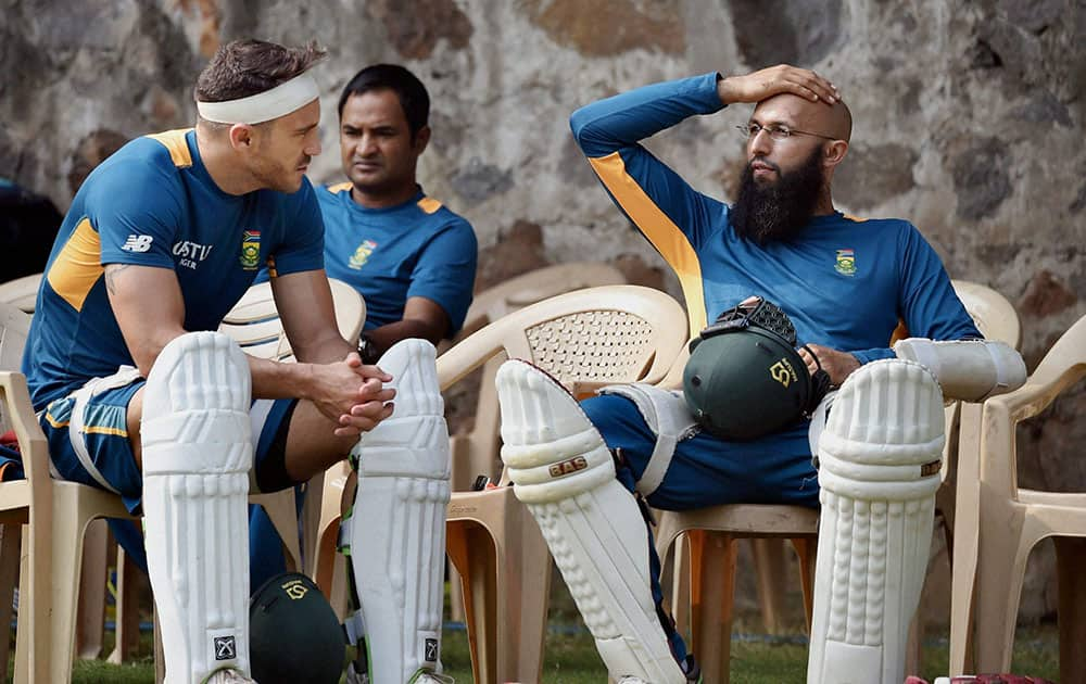 South African captain Hashim Amla with teammate Faf du Plesis during a practice sesion in New Delhi on Tuesday ahead of the 4th Test match.