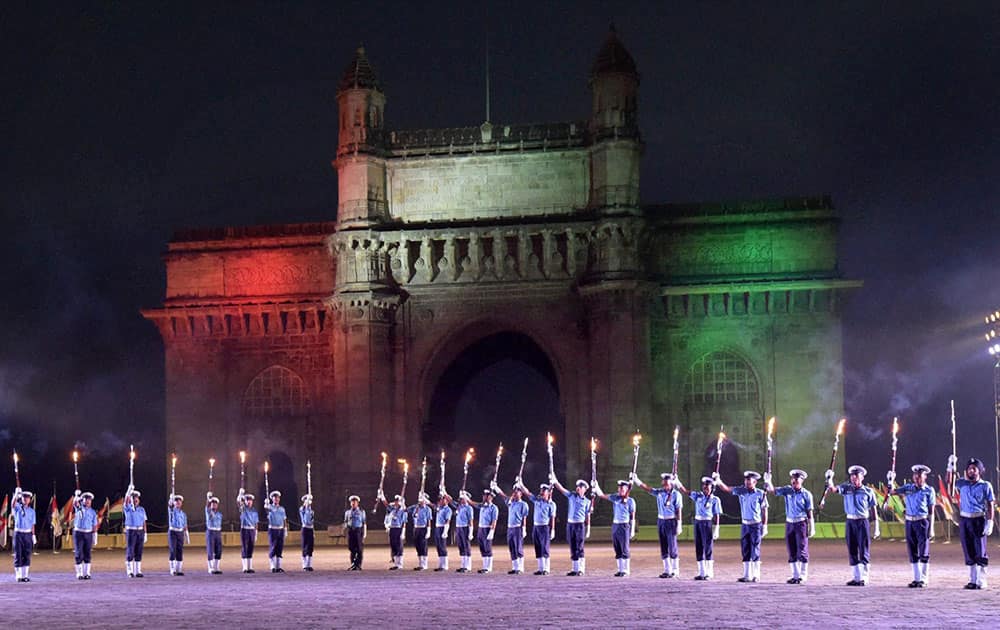 Navy soldiers rehearse for the Beating Retreat and Tattoo Ceremonies during the Navy week at the historic Gateway of India in Mumbai.