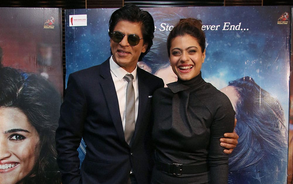 Shah Rukh Khan and Kajol pose for photographers during the photo call for the film Dilwale in a central London.