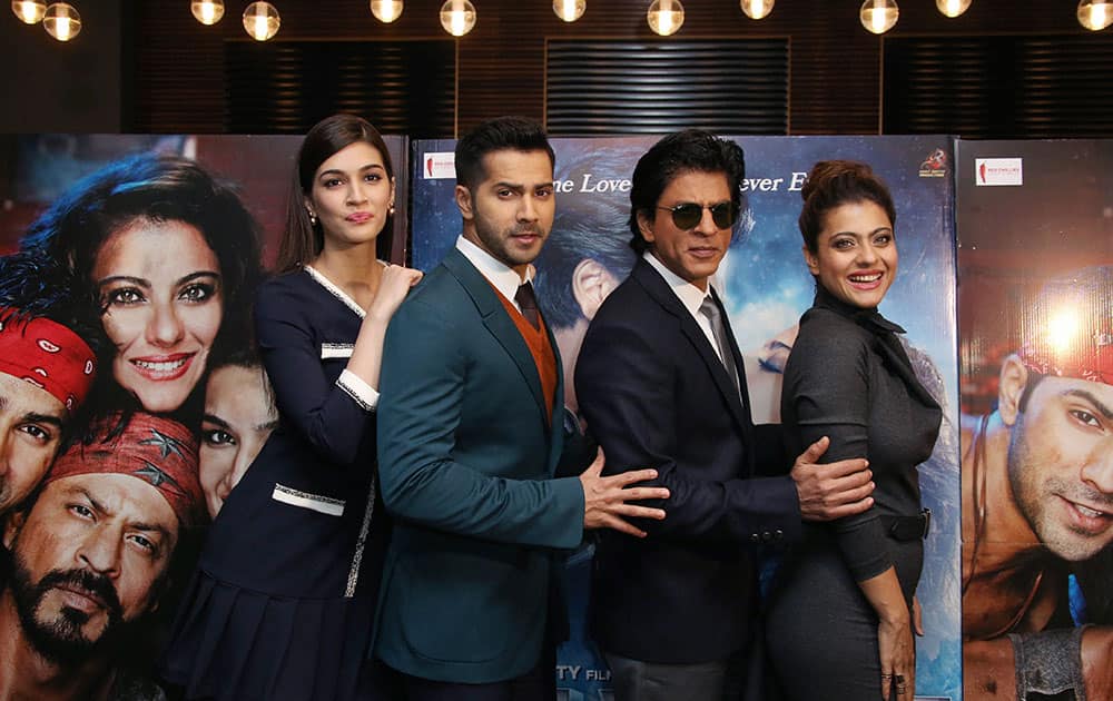 From left, Kriti Sanon, Varun Dhawan, Shah Rukh Khan and Kajol pose for photographers during the photo call for the film Dilwale in a central London hotel.