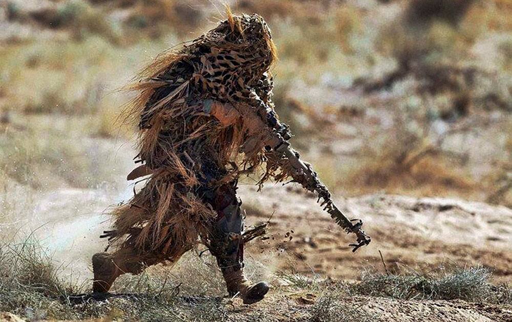 An army soldier during Command level exercise ‘Drad Sankalp’ being conducted by Southern Command of the Army in the deserts of Rajasthan.