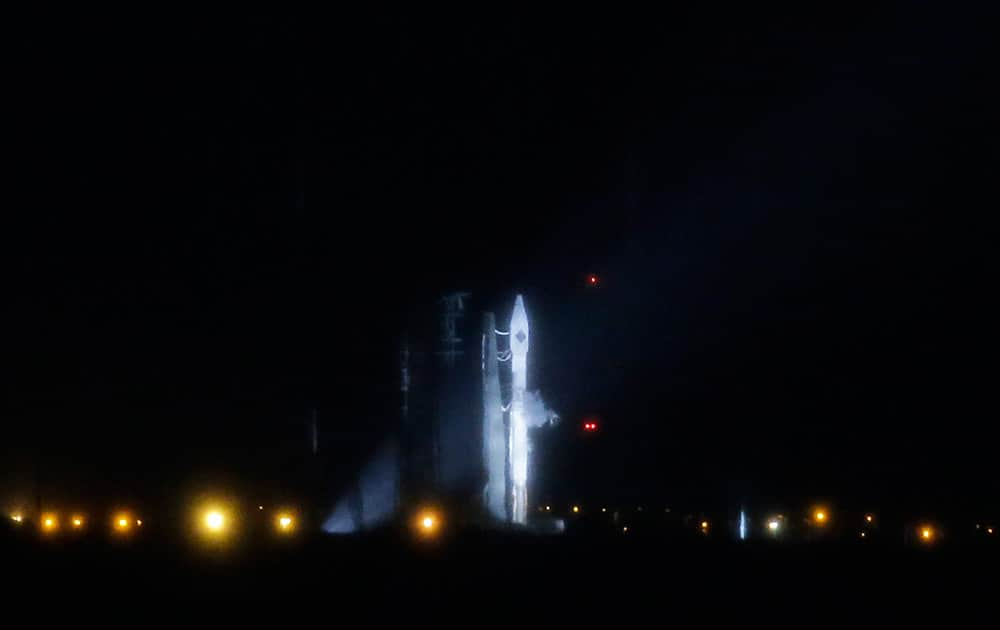 A United Launch Alliance Atlas V rocket stands ready shortly before a launch attempt was scrubbed due to poor weather conditions on launch complex 41at the Cape Canaveral Air Force Station