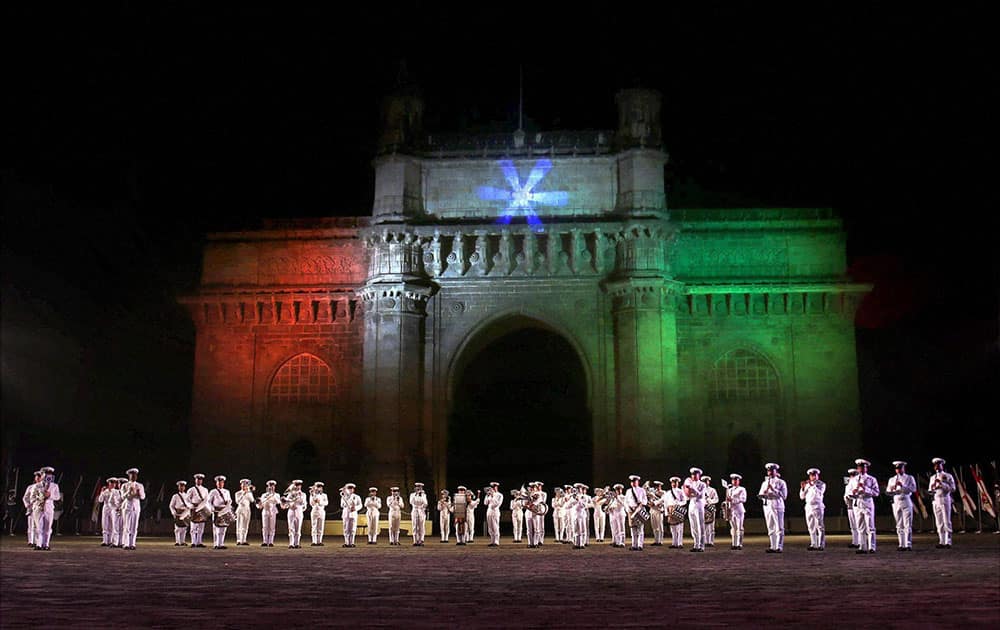 Navy soldiers at the Beating Retreat and Tattoo Ceremonies during the Navy week celebrations at the historic Gateway of India in Mumbai.