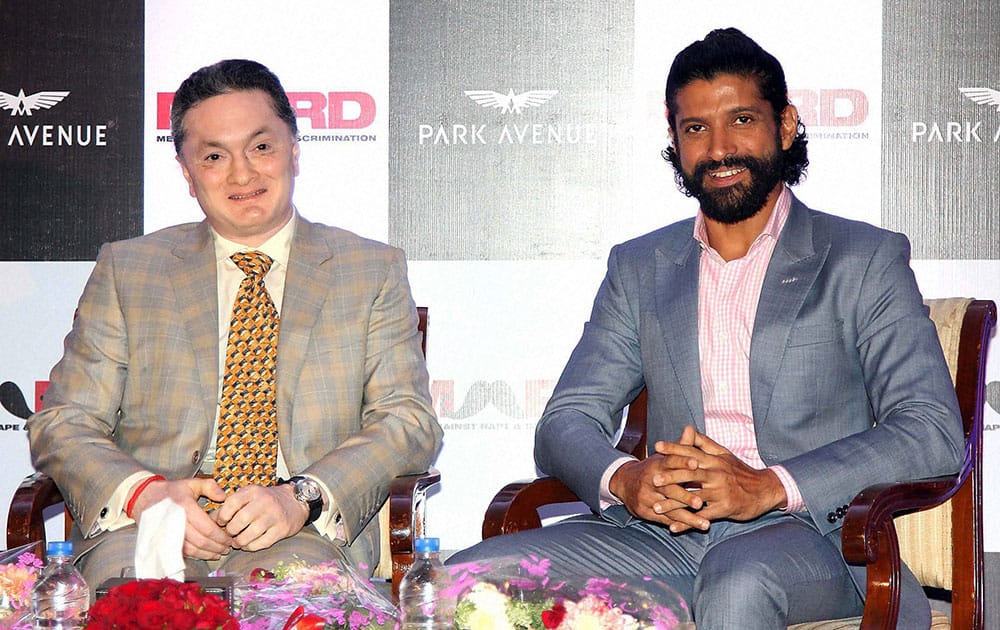 Bollywood actor and filmmaker Farhan Akhtar and Gautam Singhania, CMD, Raymond Group during the launch of Park avenue deodorants in association with Men against Rape and Discrimination (MARD), in Mumbai.