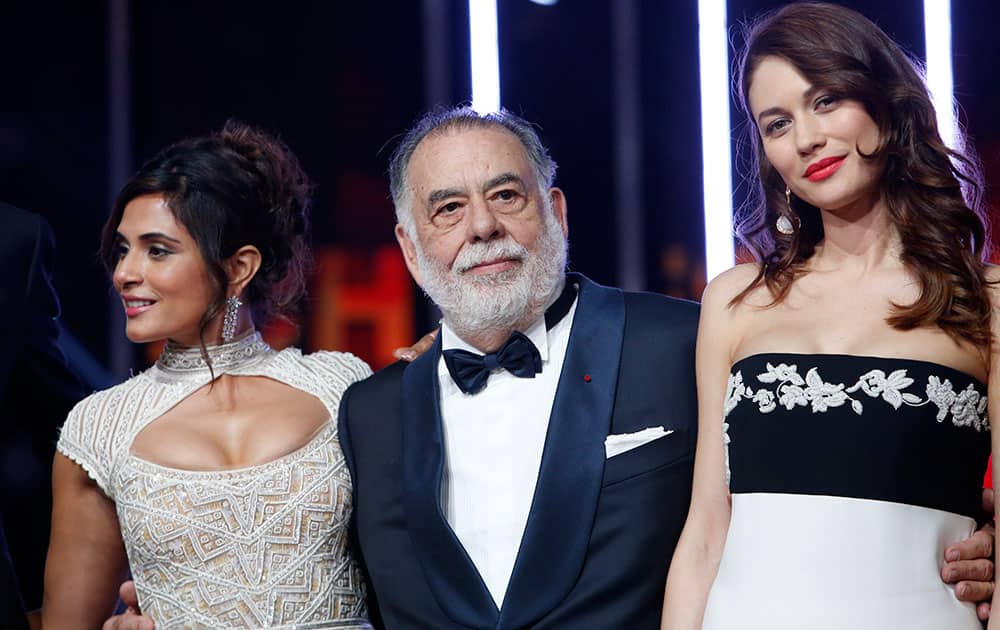 US Director and President of the Jury Francis Ford Coppola, poses with Jury members, Actress Richa Chadda and Ukrainian-born actress Olga Kurylenko during the opening night of the 15th Marrakech International Film Festival in Marrakech, Morocco.