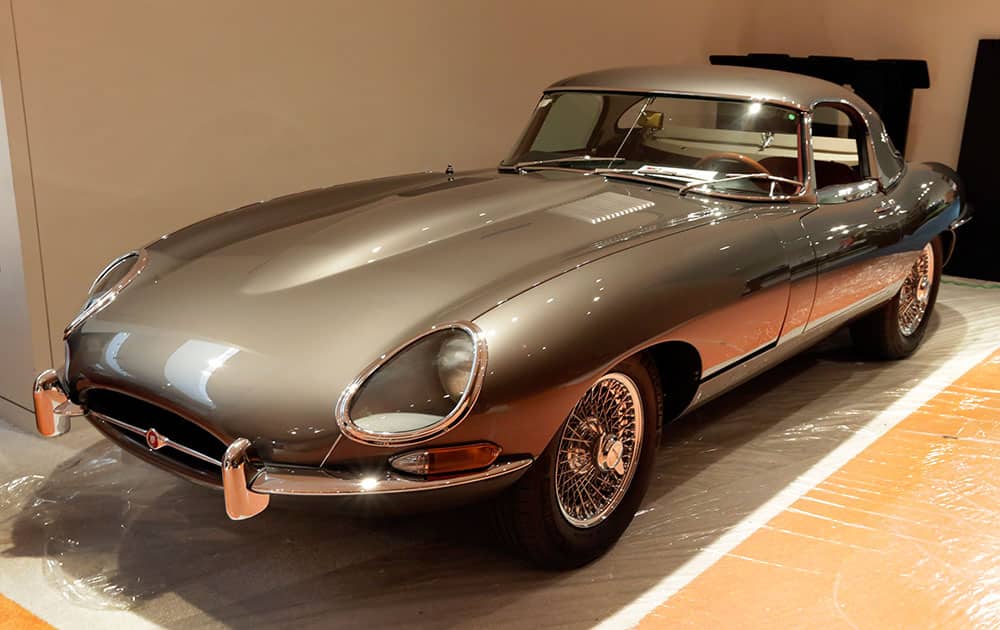 A 1965 Jaguar E-Type Series 1, estimated $250,000 - $350, 000, is displayed during a preview of the 'Driven by Disruption' sale at Sotheby's, in New York.